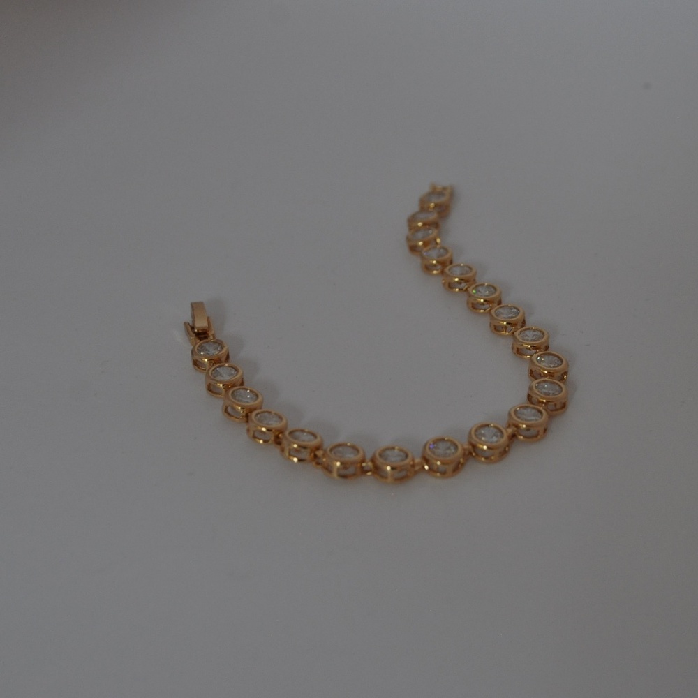 Gold Tone Bevel Set Tennis Bracelet